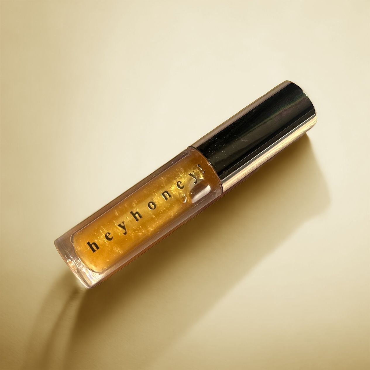 HeyHoney Getinte Lipolie | Sparkly Mango | met SPF (10 ml)